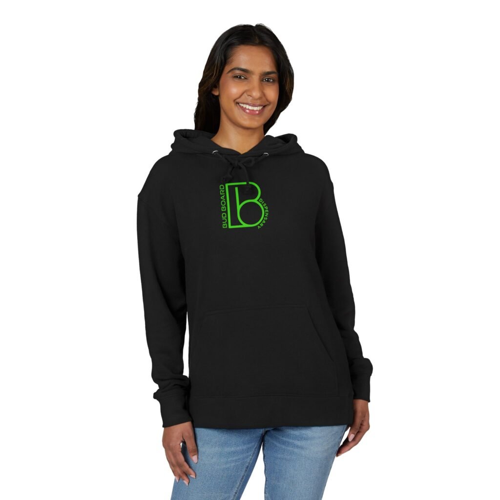 Smiling woman wearing a black Bud Board Dispensary hoodie with green logo.
