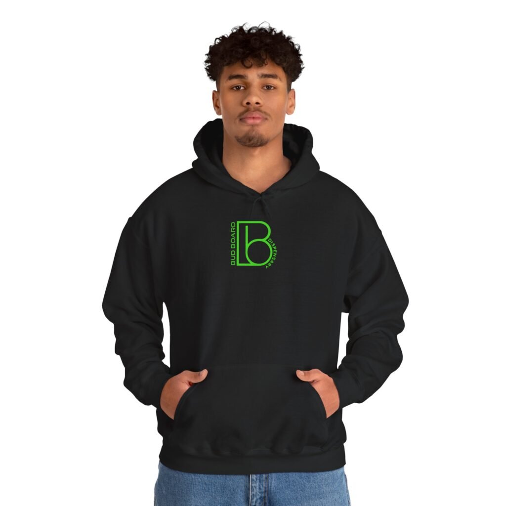 Male model wearing black Bud Board Dispensary hoodie with green logo.